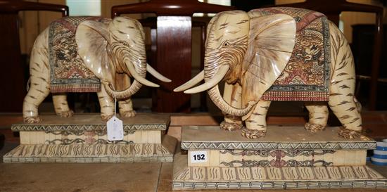 A pair of bone elephant figures